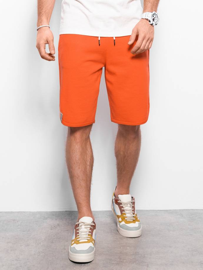 Vyriški sportiniai šortai su apvadais - oranžiniai V5 W360