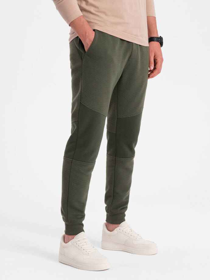 Vyriškos sportinės kelnės su tamsiai alyvuogių žalios spalvos įdėklais V3 OM-PASK-0127